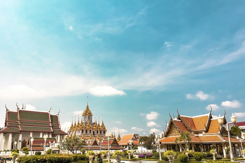 Bangkok skyline with a riverside temple